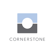 The image shows the logo for "Cornerstone." The logo consists of a square divided horizontally into two sections: the top half is light blue, and the bottom half is gray. In the center, there is a circular cutout. Below the square, the word "CORNERSTONE" is written in a clean, modern font.