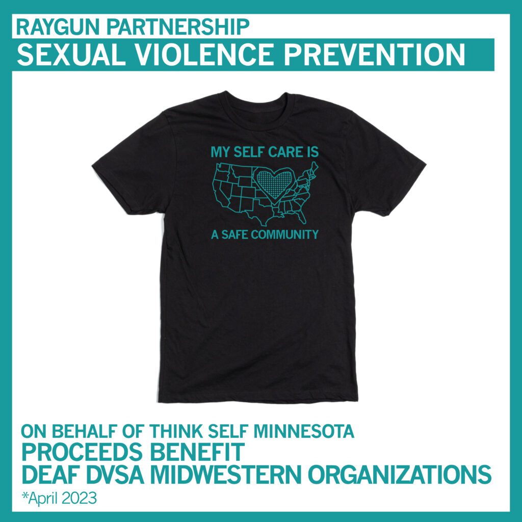 Black t-shirt with the text "MY SELF CARE IS A SAFE COMMUNITY" and an outline of the United States featuring a heart pattern. The shirt is part of a sexual violence prevention partnership by Raygun. Proceeds benefit Deaf DVSA Midwestern Organizations. April 2023 initiative by Think Self Minnesota.